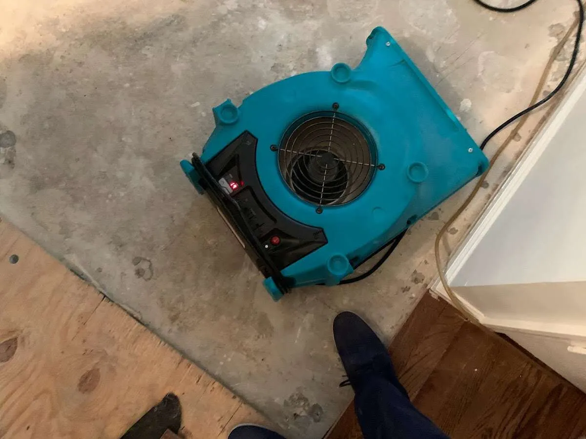 Air mover drying subfloor during Leak Detection & Repair in Diamond Bar